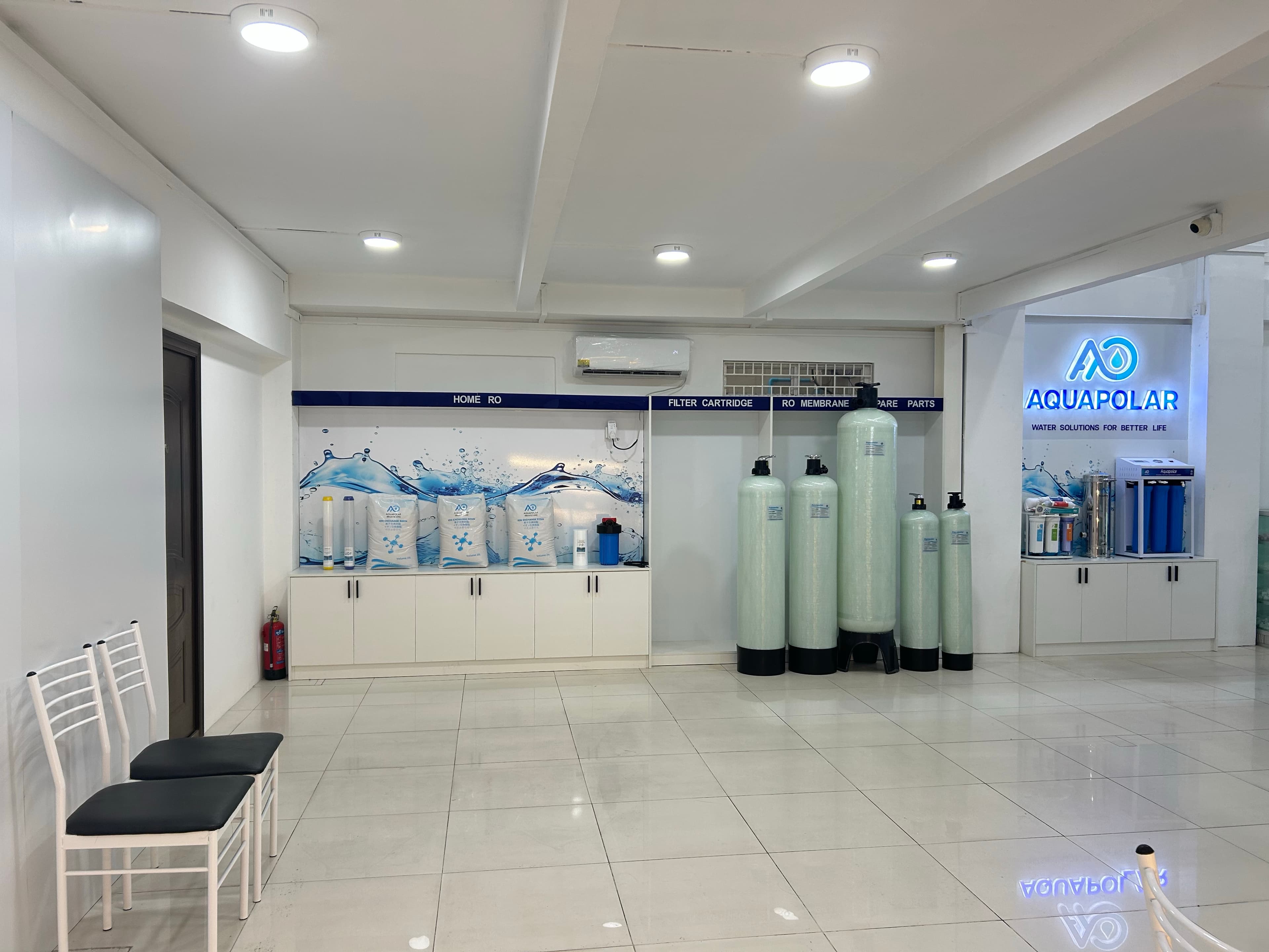 AQUAPOLAR showroom product wall — RO and water treatment