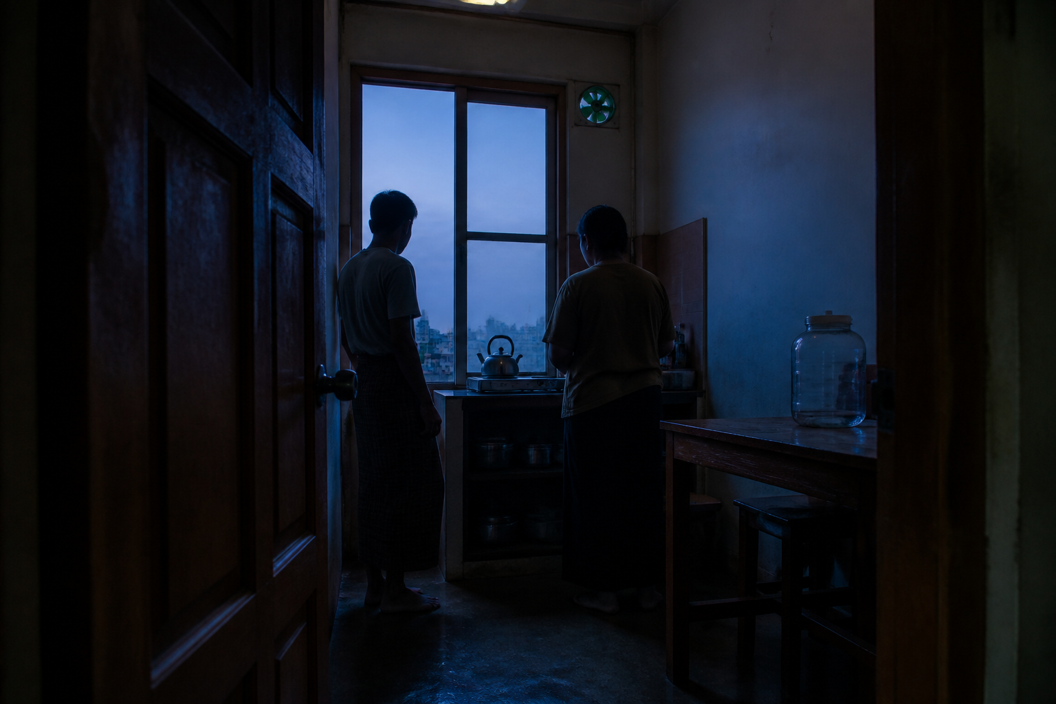 Morning kitchen — family waiting for purified water