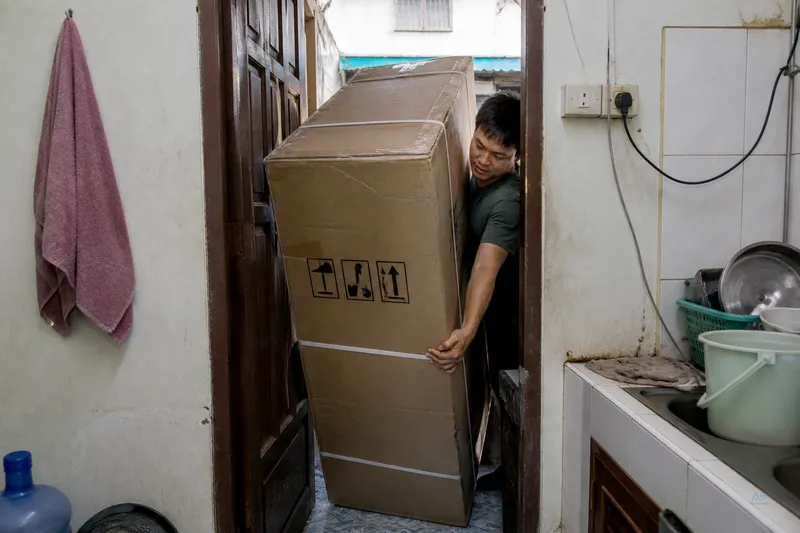 Oversized box stuck in a small kitchen doorway